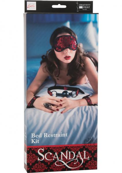 Product packaging for a 'Bed Restraint Kit' with a model wearing a red lace eye mask and handcuffs.