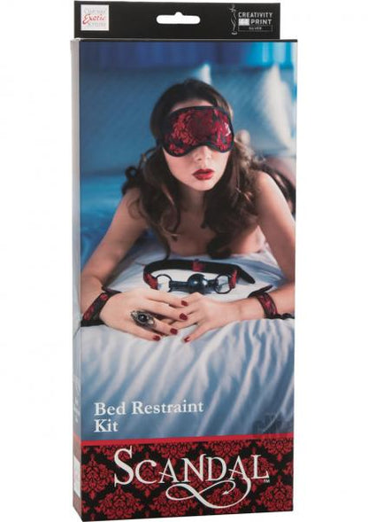 Product packaging for a 'Bed Restraint Kit' with a model wearing a red lace eye mask and handcuffs.