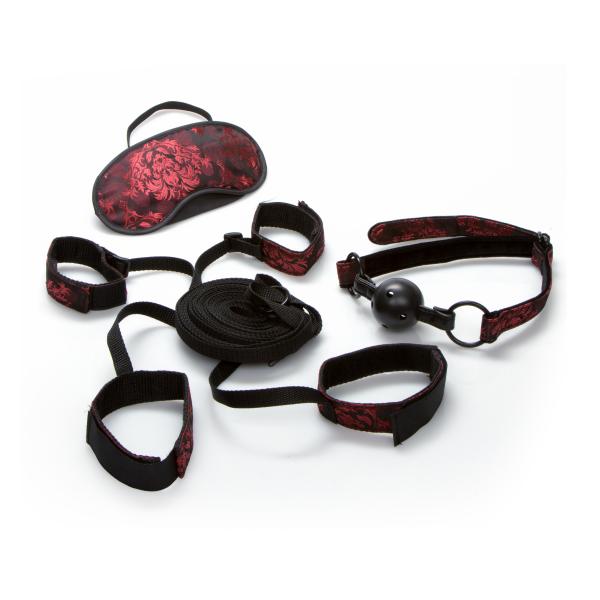Set of bondage gear with red and black patterns on a white background