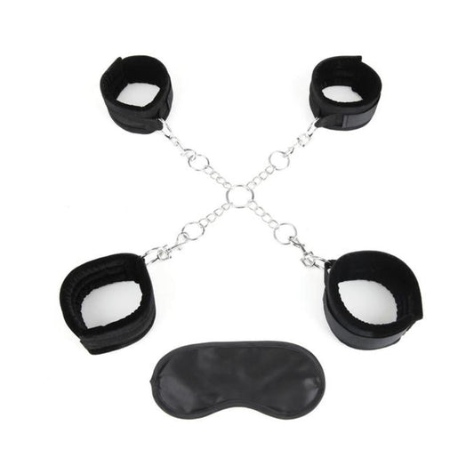 Black leather handcuffs and eye mask set on a white background